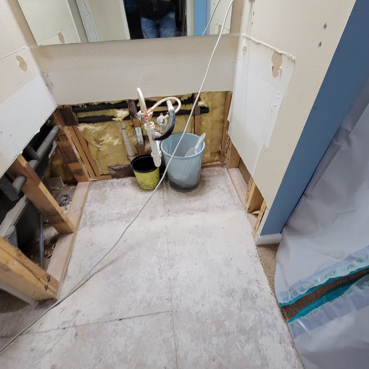 AC drainage leak that flooded the upstairs bathroom and downstairs kitchen. We set up containments, ran dehumidifiers and used air scrubbers while we removed contaminated materials.