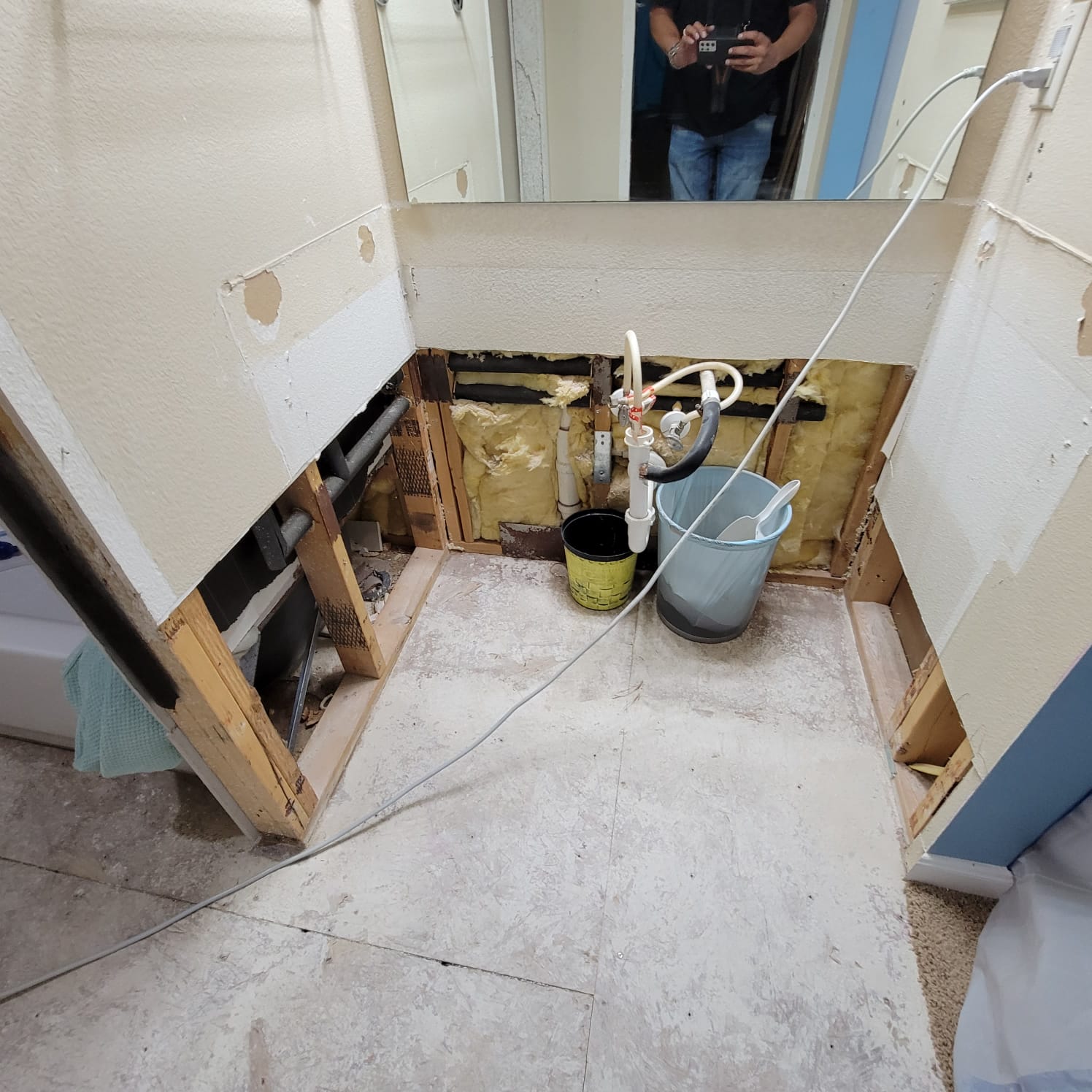 AC drainage leak that flooded the upstairs bathroom and downstairs kitchen. We set up containments, ran dehumidifiers and used air scrubbers while we removed contaminated materials.