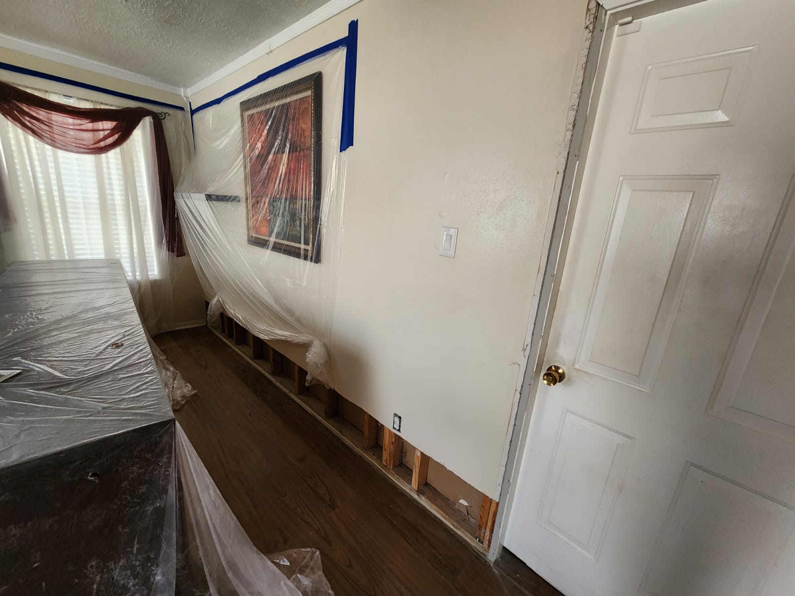 Water damage restoration after upstairs bathroom leak.