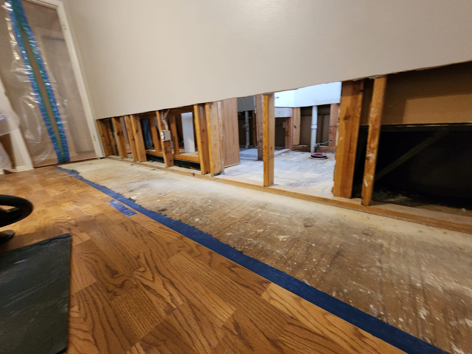 Water damage restoration after upstairs bathroom leak.