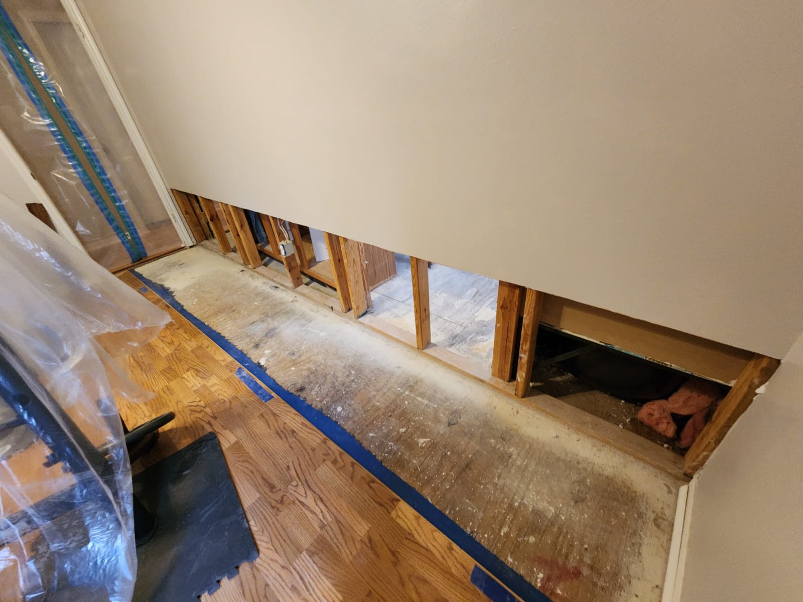 Water damage restoration after upstairs bathroom leak.