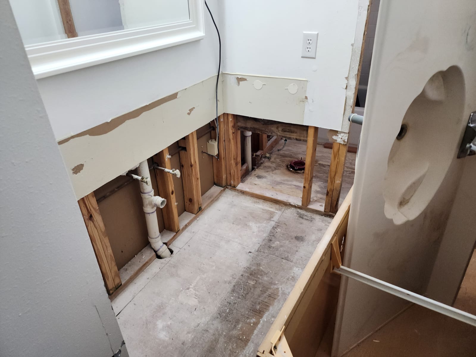 Water damage restoration after upstairs bathroom leak.