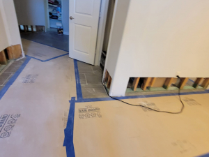 After a tub overflowed, we completed a one foot cut and dry out.