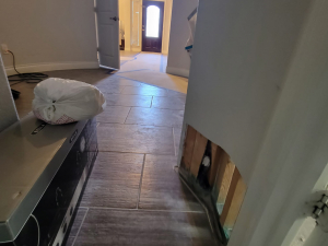 After a tub overflowed, we completed a one foot cut and dry out.