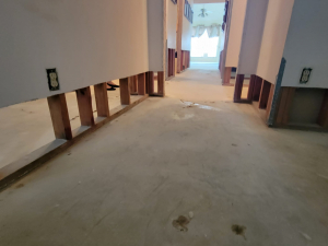 Water damage restoration after a toilet tank busted and flooded this Houston, TX house