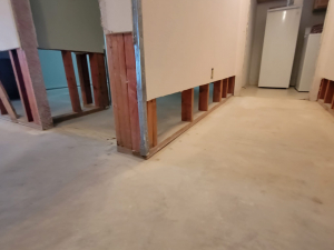 Water damage restoration after a toilet tank busted and flooded this Houston, TX house