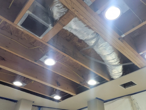 AC drainage leak that flooded the upstairs bathroom and downstairs kitchen. We set up containments, ran dehumidifiers and used air scrubbers while we removed contaminated materials.