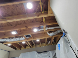 AC drainage leak that flooded the upstairs bathroom and downstairs kitchen. We set up containments, ran dehumidifiers and used air scrubbers while we removed contaminated materials.