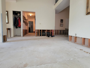 Water damage restoration after a toilet tank busted and flooded this Houston, TX house