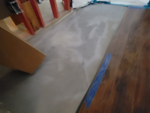 We extracted the water, dried out the home, and cut out and replaced the damaged materials after a washer overflowed.