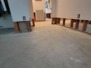 Water damage restoration after a toilet tank busted and flooded this Houston, TX house