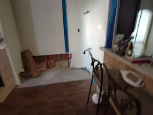 We extracted the water, dried out the home, and cut out and replaced the damaged materials after a washer overflowed.