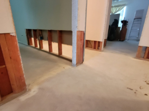 Water damage restoration after a toilet tank busted and flooded this Houston, TX house