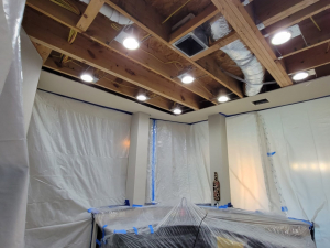AC drainage leak that flooded the upstairs bathroom and downstairs kitchen. We set up containments, ran dehumidifiers and used air scrubbers while we removed contaminated materials.