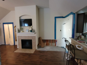 We extracted the water, dried out the home, and cut out and replaced the damaged materials after a washer overflowed.